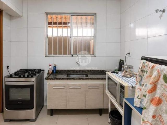 Sobrado em Villagio 2 Dormitórios, Churrasqueira e Quintal no Estuário Santos SP