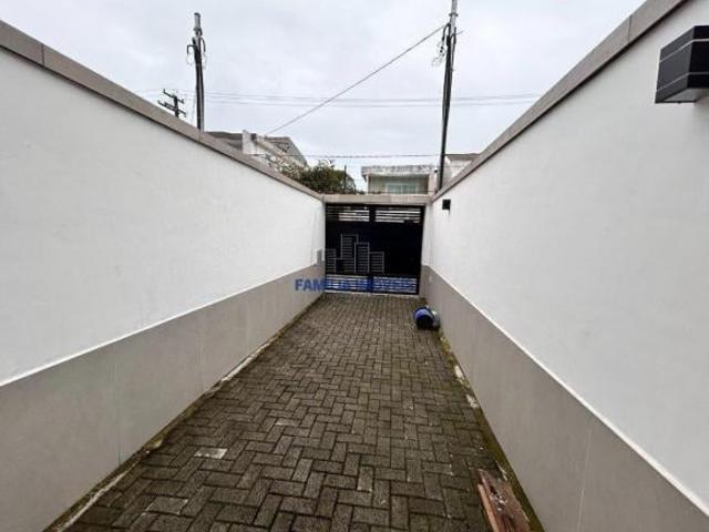 Sobrado para alugar vender 3 quartos garagem Estuário Santos SP