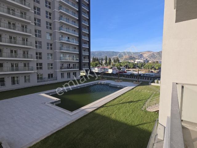 Söke Emlak Ofisinden Yenicami Mahallesindehavuzlu Sitede Kiralık