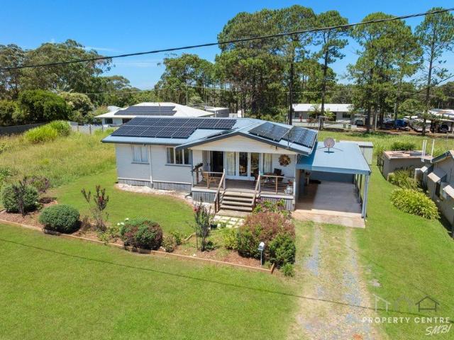 SOLD BY SUE AND DONNA Affordable Island Living Awaits You Close to Town