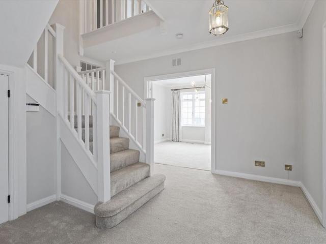 SOLE AGENT* Available to let in the prestigious gated residential estate of St George's Hill, Weybridge, is this delightful family home featuring quite stunning panoramic views to the rear