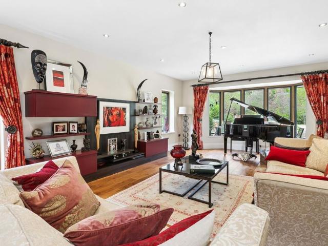 SOLE AGENT* An exceptional family home set behind electric gates with tennis court and superb grounds