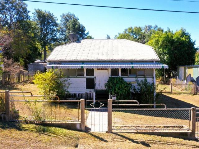 Solid 2 Bedroom Renovator On Near Level ish Block