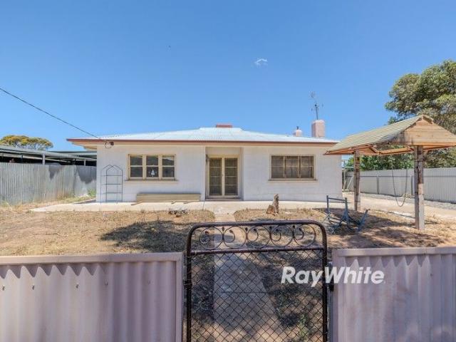Solid three bedroom house + bungalow!