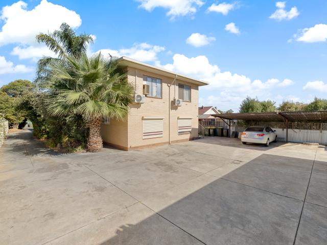Solid upstairs unit in a group of 8