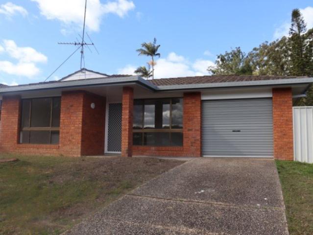 Solid brick & tile family home