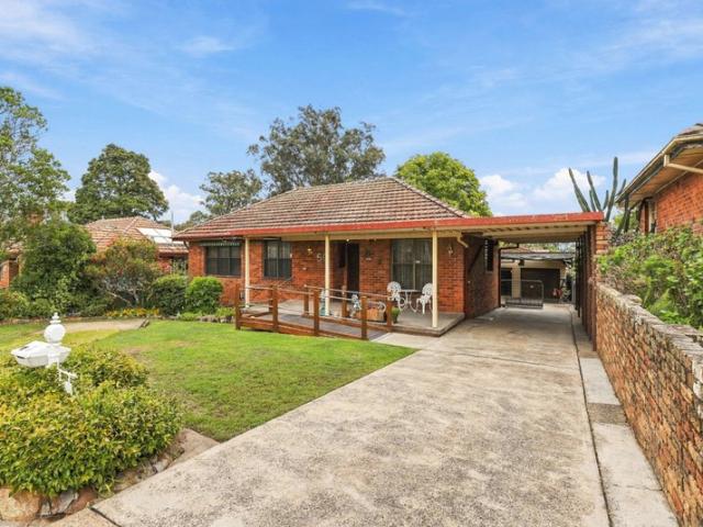 Solid Brick & Tile Home with Exceptional Shedding and Entertaining