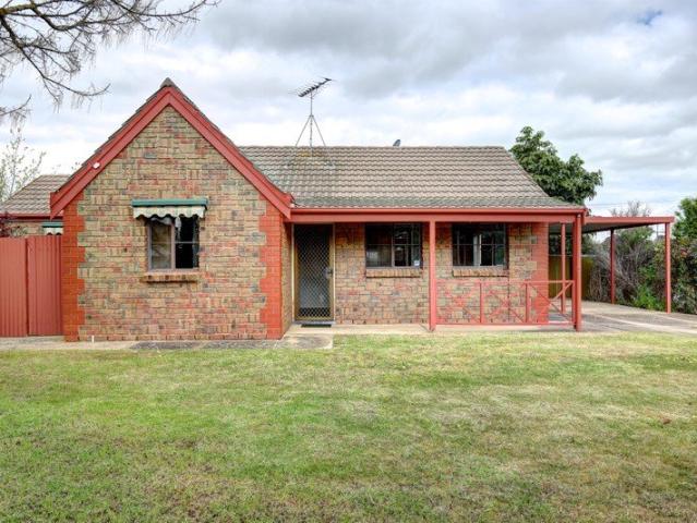 Solid brick unit close to river & main street
