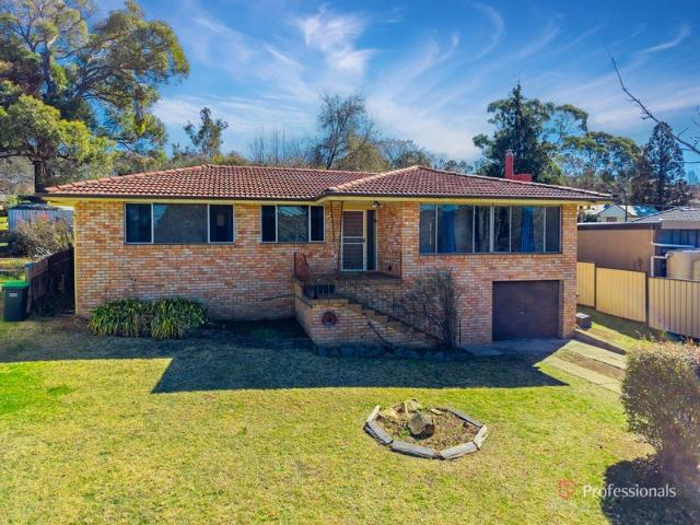 Solid Brick Family Home in Sought After North Hill