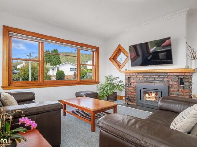 Solid brick gem with splendid river & city views!