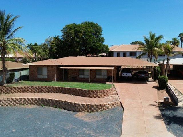 Solid Brick Home in a Prized Pretty Pool Location