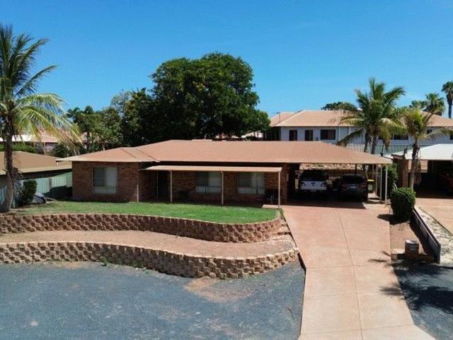 Solid Brick Home in a Prized Pretty Pool Location