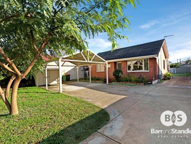 Solid Brick Home Packed with Potential