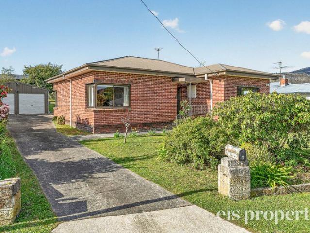 Solid Brick Home, Sheds Galore & Prime Location