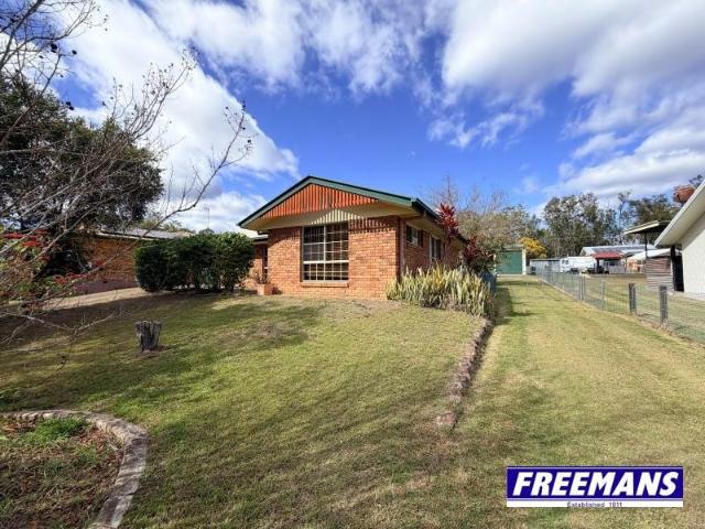 Solid brick home with 12x7m shed