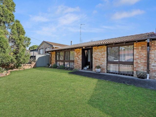 Solid Brick Home with Great Potential!