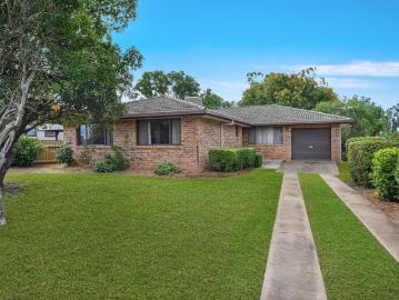 Solid Brick Home with Endless Potential & Exceptional Outdoor Living