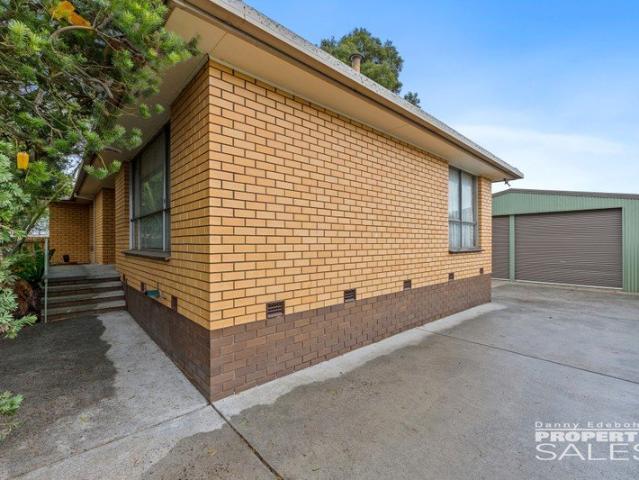 Solid Brick Home with Huge Shed & Outstanding Potential