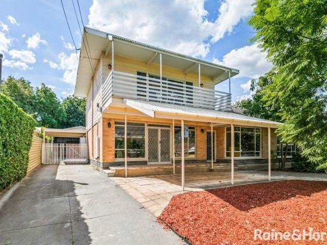 Solid Brick Home with Large Living Areas and Gorgeous Eastern Hill Views