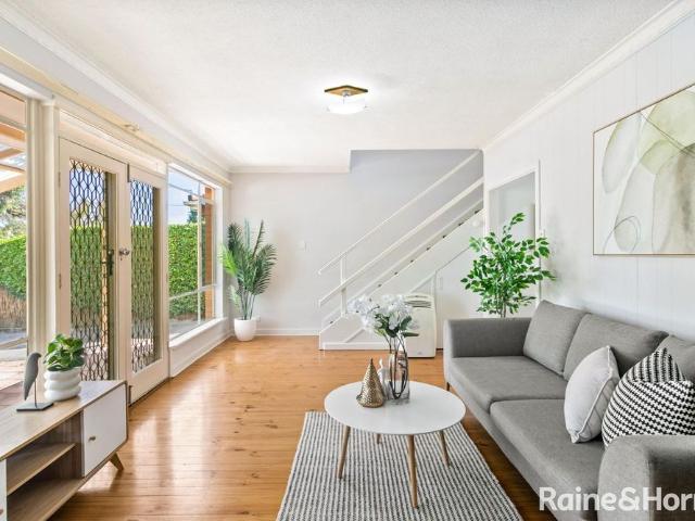 Solid Brick Home with Large Living Areas and Gorgeous Eastern Hill Views