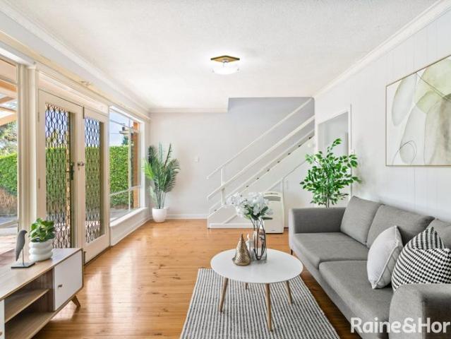 Solid Brick Home with Large Living Areas and Gorgeous Eastern Hill Views