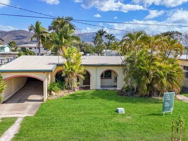 Solid Brick Home with Side Access, Sheds & Stables