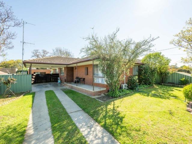 Solid Brick Home with Plenty to Offer