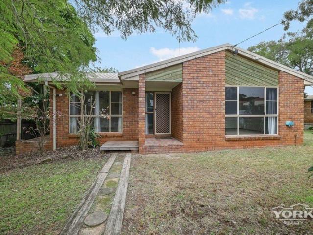 Solid Brick Home with Renovation Potential in a Growing Rockville Location