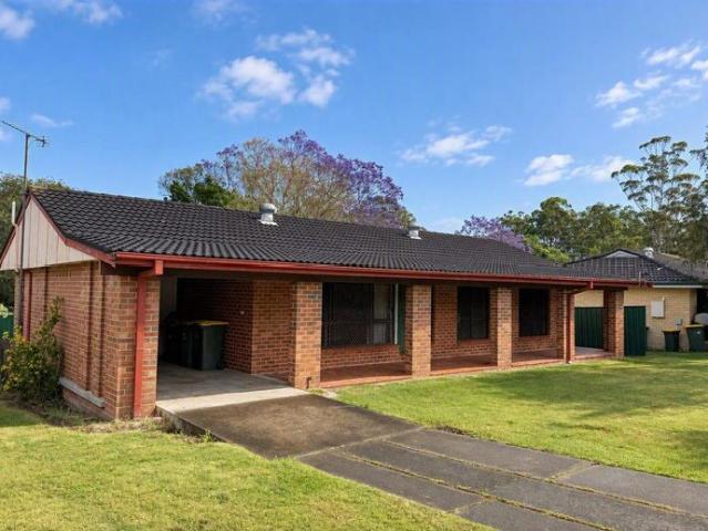 Solid Brick Living with a Large Backyard