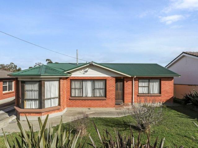 Solid brick property, generous landholding and excellent side access