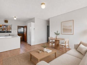Solid Brick Spacious Ground Floor Unit with Great Market Entry Appeal