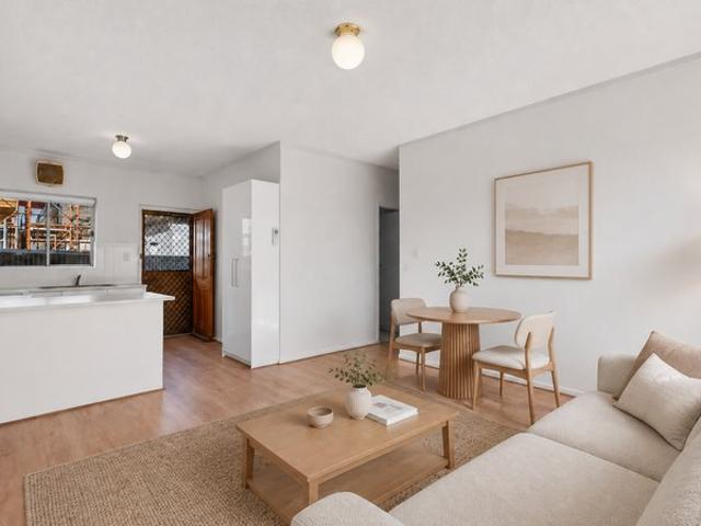 Solid Brick Spacious Ground Floor Unit with Great Market Entry Appeal