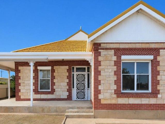 Solid Character Home with Versatile Corner Allotment & Future Potential