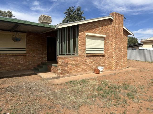 Solid Double Brick Home with Great Outdoor Living and Dual Driveways