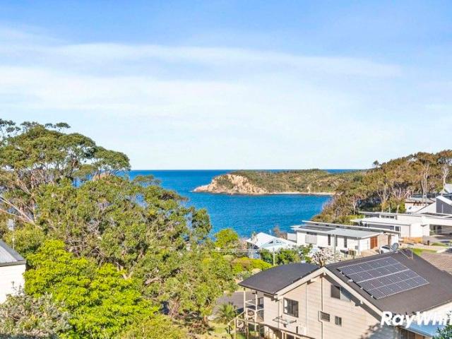 SOLID FAMILY HOME WITH STUNNING OCEAN VIEWS!