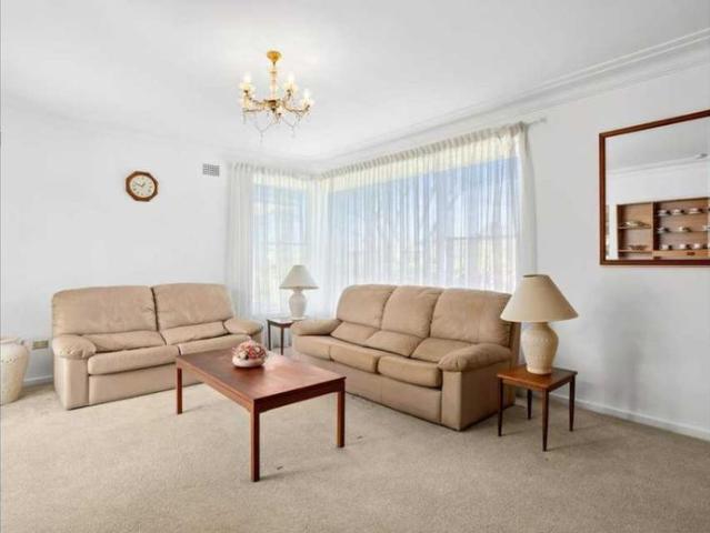 Solid family home on level block