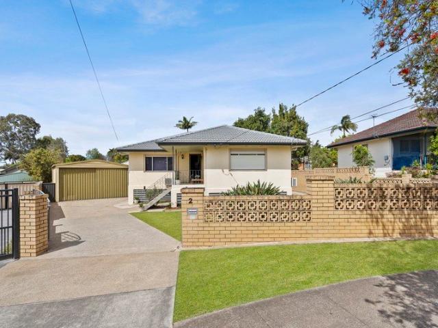 SOLID HOME WITH DUAL DRIVEWAY ACCESS