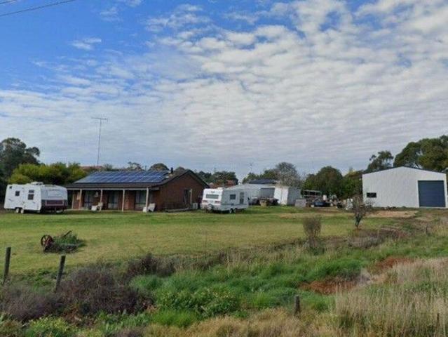 SOLID HOME WITH MASSIVE SHEDDING, SOLAR & BUSINESS POTENTIAL