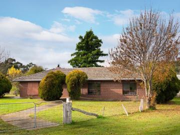 Solid home with space, land and serious workshop appeal