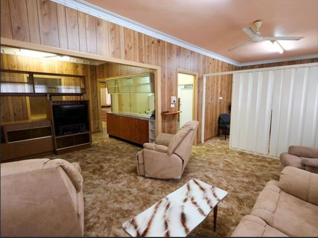 Solid Red Brick Home With Shed