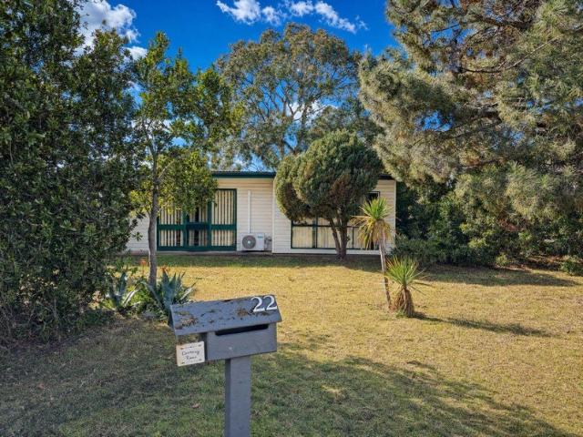 Solid single level home, big shed, and a block with room to move