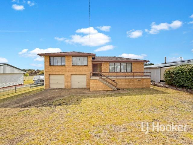 Solid Split Level Home with Excellent Shedding