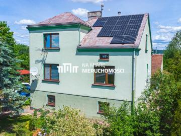 Solidny dom z dużym ogrodem i fotowoltaiką w Jaśle
