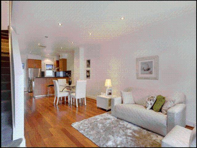 Sophisticated City Living with a Rooftop Entertainer