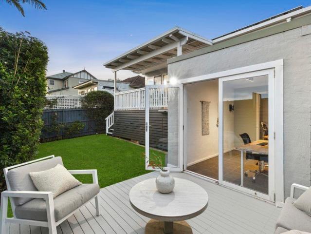 Sophisticated coastal home with studio and district outlooks