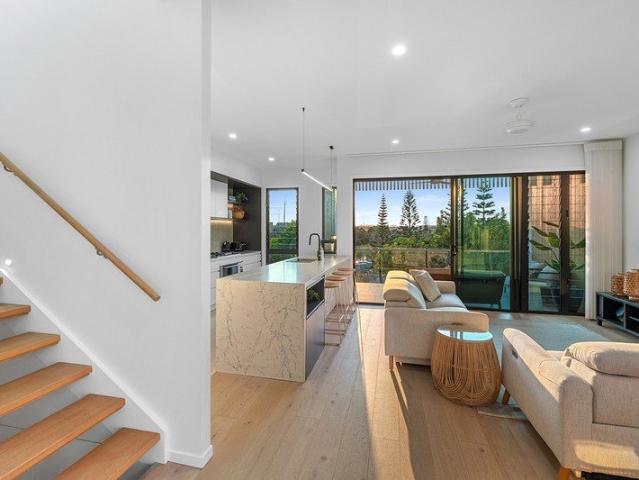 Sophisticated Coastal Living in a Premier Beachside Setting