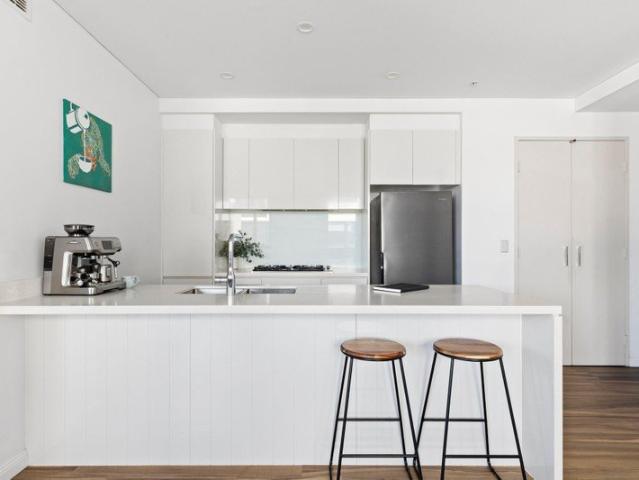 Sophisticated corner apartment with resort style facilities in the heart of Dee Why