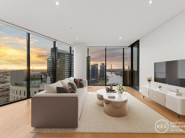 Sophisticated Corner Living with Uninterrupted Waterfront Views!