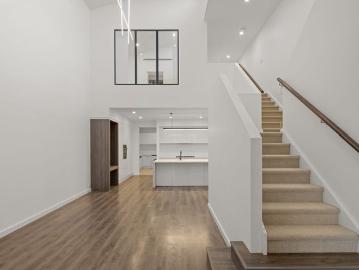 Sophisticated Executive Living with an Unexpectedly Expansive Design