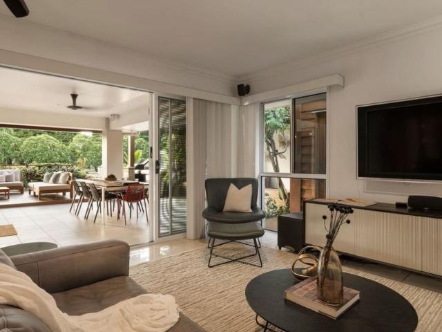 Sophisticated Executive Retreat Offering Prestigious Riverfront & Parkside Living
